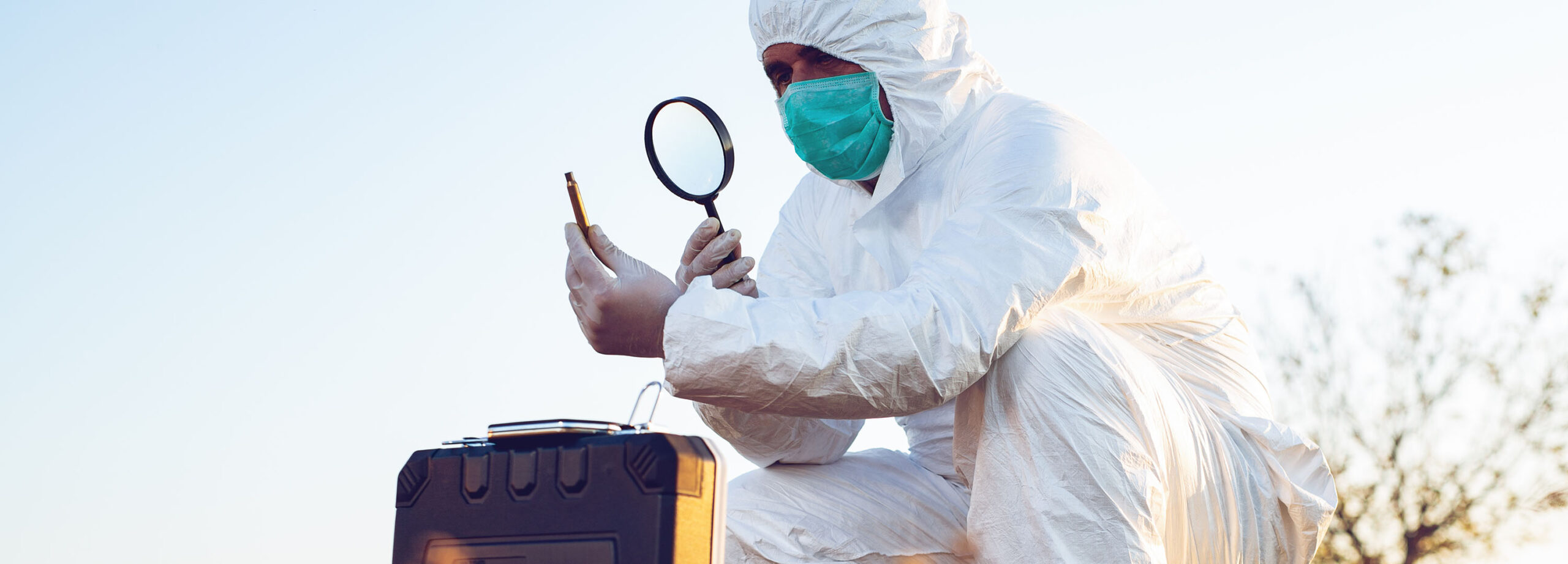 Criminologist investigates a crime scene.